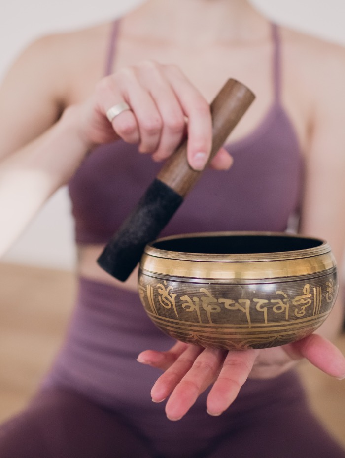 restorative and sound healing with tibetan bowl creating vibration and frequency