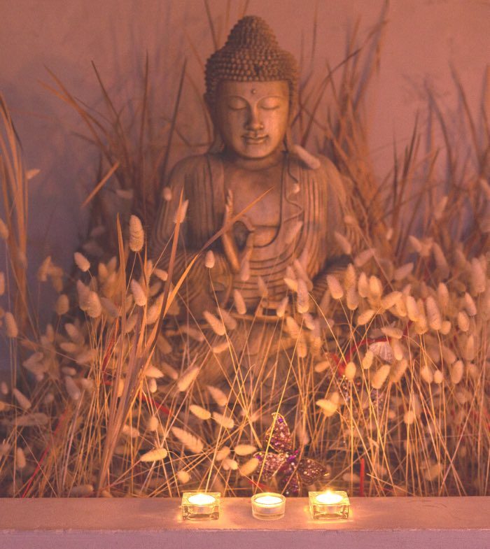 Meditation with buddha and candles shanine dennill