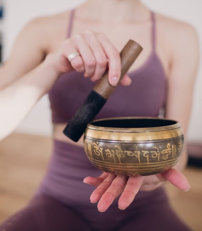 restorative and sound healing with tibetan bowl creating vibration and frequency