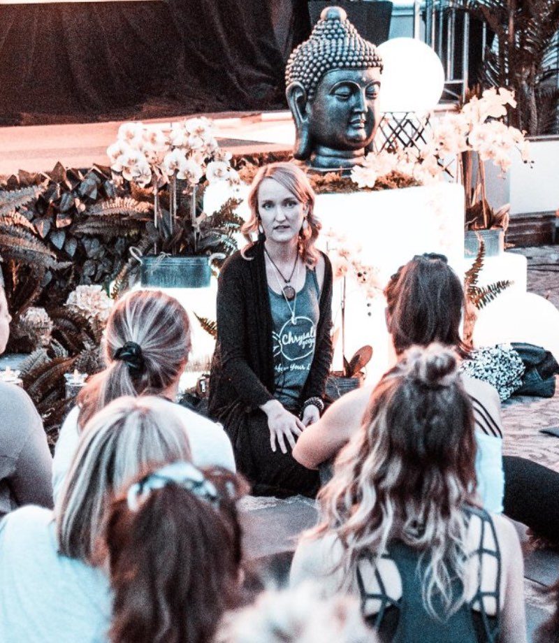 Shanine Lee Dennill teaching a yoga event at a yoga festival